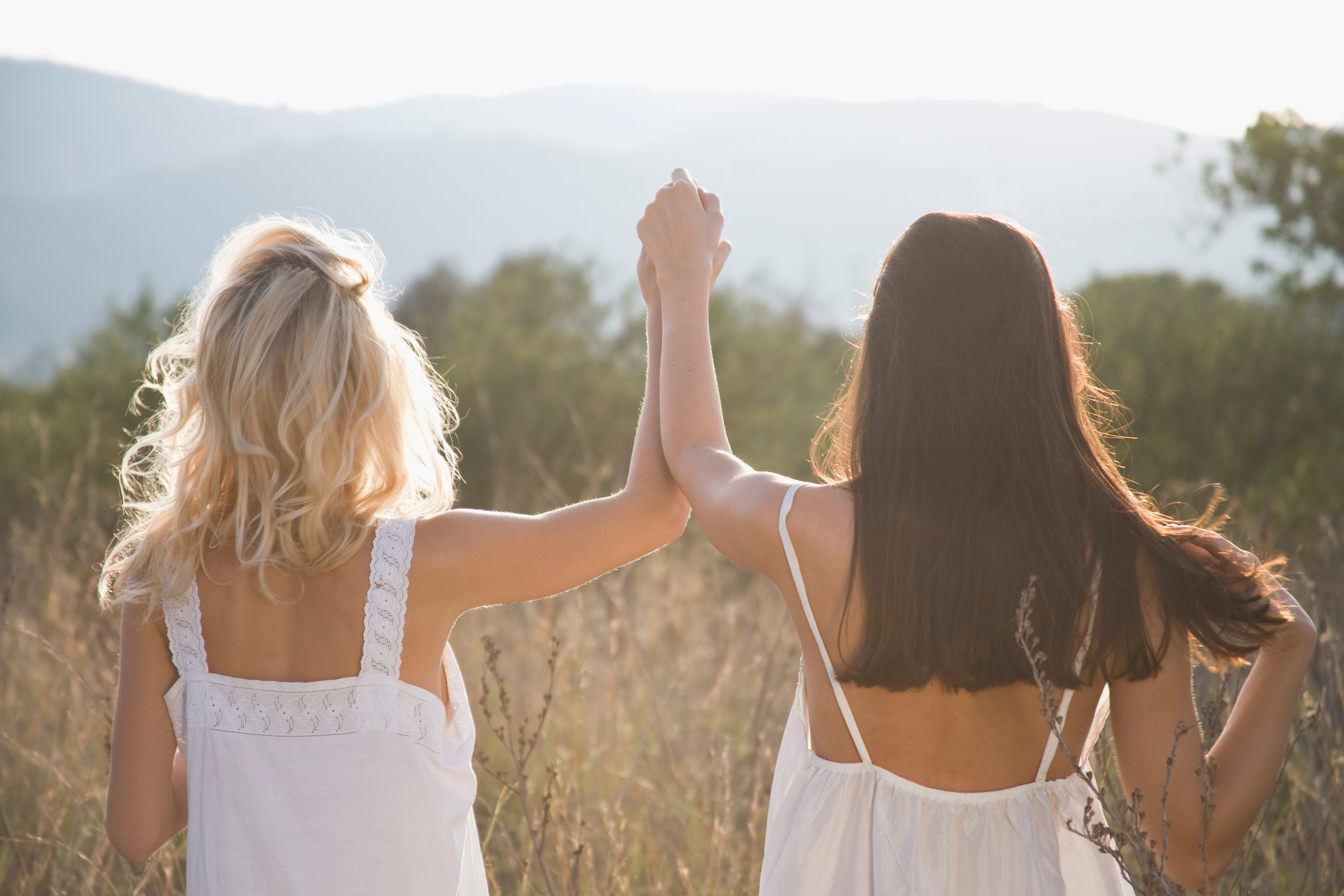 Women holding hands